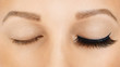 © Olesia - Female eyes with long false eyelashes, befor and after effect. Eyelash extensions, make-up, cosmetics, beauty