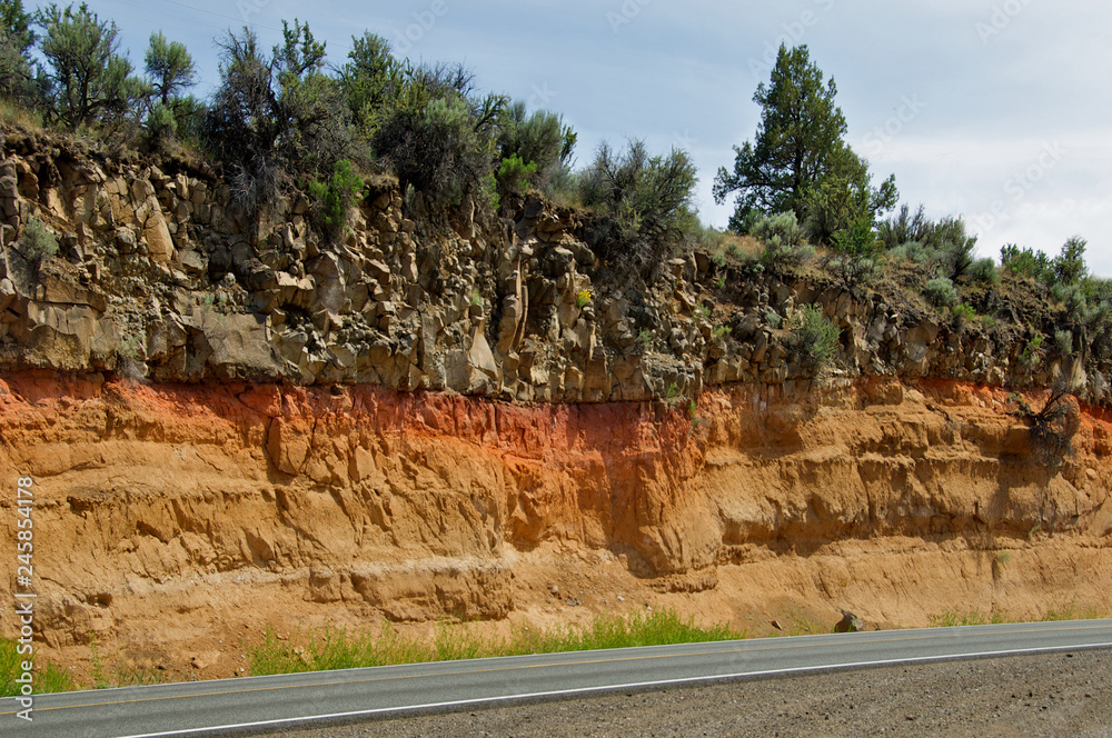 Basalt Flow, Baked zone and ash deposits in Road Cut, on Highway 395 ...