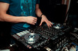 © Семен Саливанчук - Dj mixes the track in the nightclub at party.