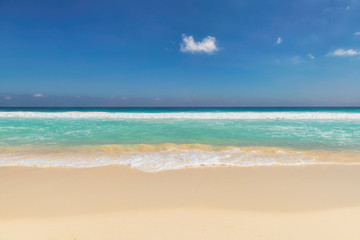 Caribbean sandy beach with turquoise sea. Tropical beach background.