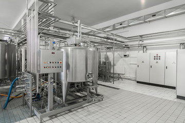 Wall Mural - general view of the interior of a milk factory. equipment at the dairy plant
