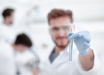 Wall Mural - closeup. scientist with beaker
