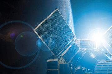 Wall Mural - space satellite in outer space orbiting the earth. elements of this image furnished by nasa а