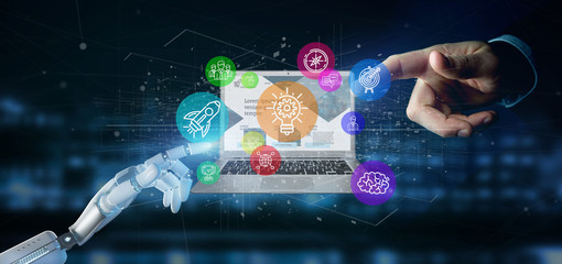 Poster - cyborg hand holding a cloud of colorfull start up icon bubble with a laptop 3d rendering