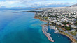 Aerial drone bird's eye view of small marina with boats docked in Voula, Athens riviera, Attica, Greece