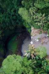 Wall Mural - Chamarel Waterfall on the south of the island of Mauritius as seen from a helicopter.