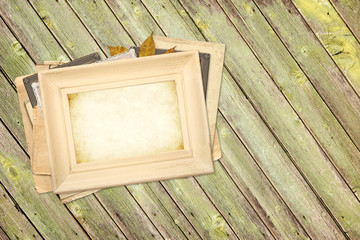 Canvas Print - Vintage photoframes on old wooden planks