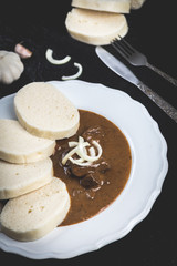 Wall Mural - Beef goulash with dumplings