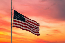 American Flag On The Sunset Sky Background