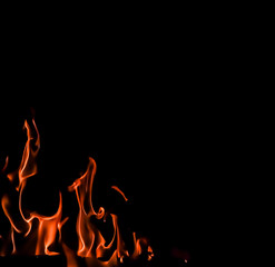 Flames of fire on a black background. Space for copy, text, your words