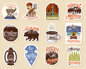 camping logo and labels. mountains and lumberjack, brown bear and goat, pine trees. trip in the fore