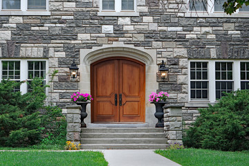 Poster - elegant double wooden front door  of upper class stone fronted house