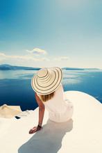 Luxury Travel Vacation Woman Looking At View On Santorini Island