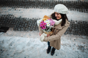 woman with bouquet of flowers