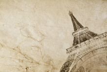 Old Vintage Paper Texture Background With The Silhouette Of The Eiffel Tower In Paris. High-quality Photo Texture Of Old Vintage Paper With Scuffs, Cracks And Drops Of Spilled Coffee.