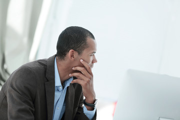 closeup .young businessman looking at copy space