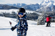 © Tomsickova - Cute preschool child, skiing in Austrian winter resort on a clear day