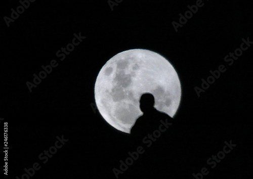 Man Looks At Full Moon Over Sydney Australia Buy This Stock