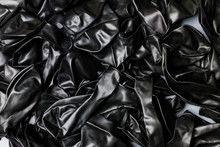 Pile Of Deflated Black Balloons On A White Background. Clean Pure Baloon Template. Logo, Texture, Pattern Presentation Plain Aerostat Design Element.