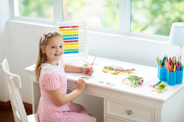 Wall Mural - Child drawing. Kids paint. Girl after school.