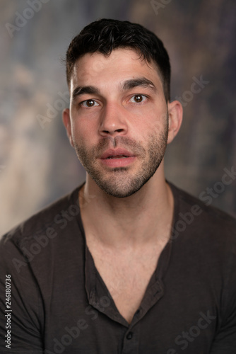 Handsome Caucasian White Male With Black Short Hair And Stubble