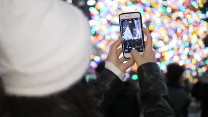 Wall Mural - Taking photos of the beautiful Christmas decoration