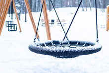 Snow Covered Playground In Winter Time