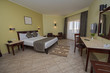© Paul Vinten - Double bed in a luxury suite of a hotel room