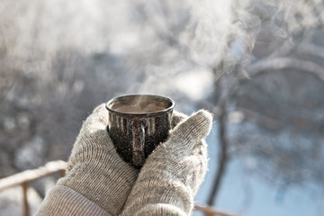 woman hands holding hot cup coffee, tea