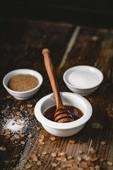 Wall Mural - different kinds of sugar and maple syrup on a background