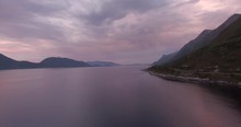 Aerial Timelapse Of Vartalfjorden In √òrsta In Norway. Cars Driving By With Beautiful Colourful Sky.