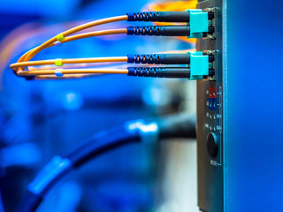 Poster - Electrical Circuits. The electric wire behind the control board with lighting effect,Industrial Electrical Concept. Wiring PLC Control panel with wires industrial factory