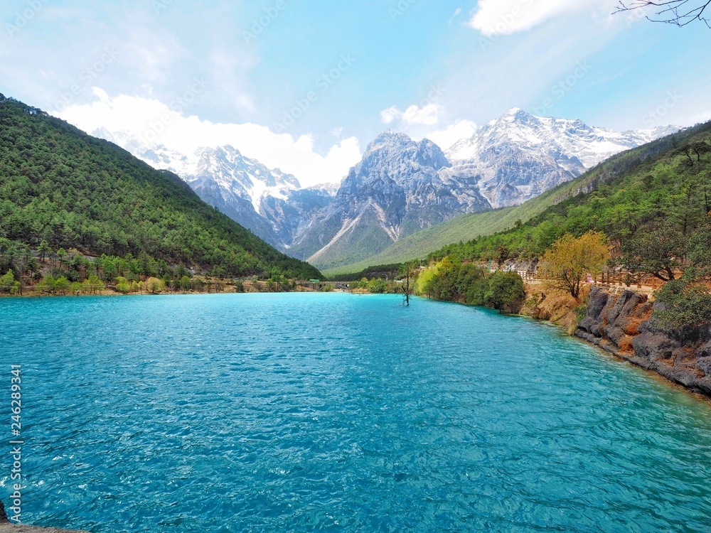Beautiful lake at Blue Moon Valley with background of Jade dragon snow