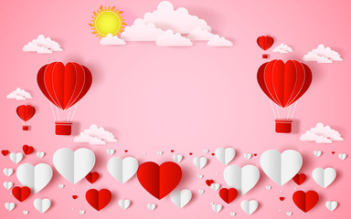 Wall Mural - The hot air heart balloon, sun and countryside on pink sky as love, happy valentine's day, wedding and paper art concept