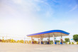 Petrol gas fuel station with clouds and blue sky