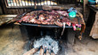 © homocosmicos - Close-up view to grilled meat as street food , Niamey, Niger