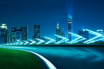 Wall Mural - Motion blurred racetrack,cityscape night scene cold mood. with arrow light Effects.