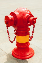 Red Fire Hydrant On The Street