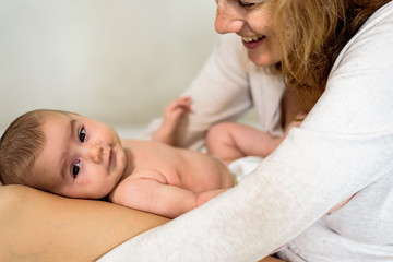 Sticker - Pretty carefree baby happy with her mommy