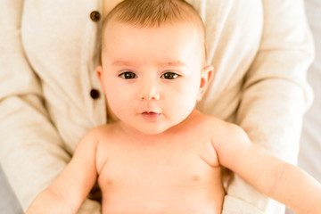 Wall Mural - Pretty carefree baby happy with her mommy