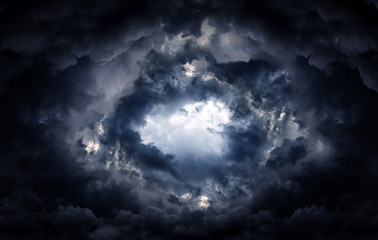 Wall Mural - hole in the storm clouds