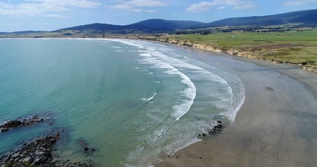 Wall Mural - New Zealand aerial drone footage of coast and beach nature landscape at Te Waewae Bay by Orepuki in the Southland region of the south island of New Zealand.