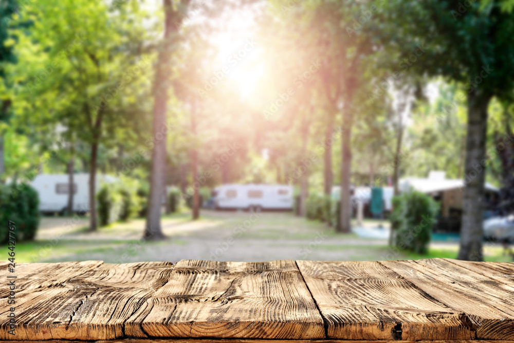 Table background of free space and camping background  - obrazy, fototapety, plakaty 