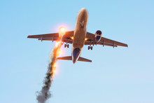 Passenger Plane Landing With A Burning Engine, Emergency Situation. Concept Disaster