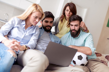 Sticker - Group of friends watching football game at home