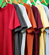 © Ralph Smith - Colorful T-shirts on a green background