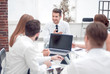 © ASDF - business team holds a meeting in a bright office