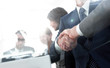 © ASDF - handshake of business partners in conference room