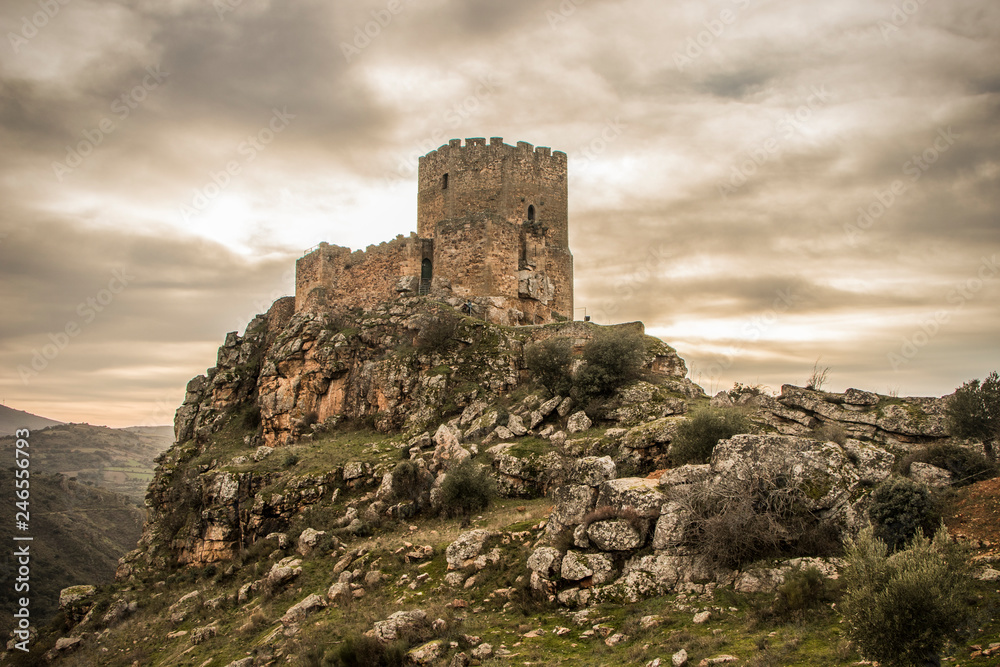 Medieval castle on a cliff on a cloudy day, Algoso, Vimioso, Miranda do Douro, Bragança, Tras-os-Montes, Portugal - obrazy, fototapety, plakaty 