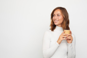 Wall Mural - portrait of happy young woman with to go cup of coffee